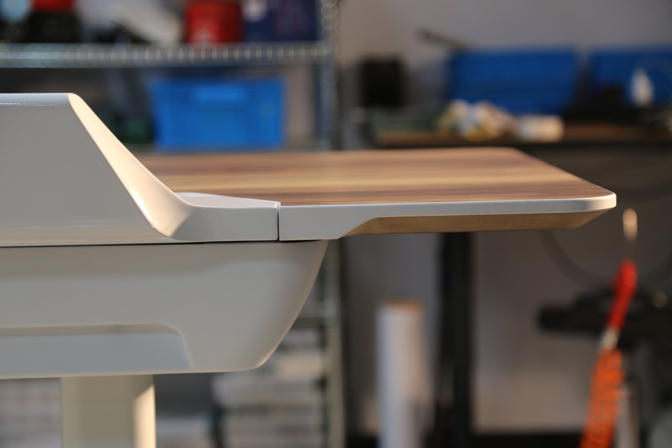 Close-up of the Herman Miller T2 work-surface edge and painted structure