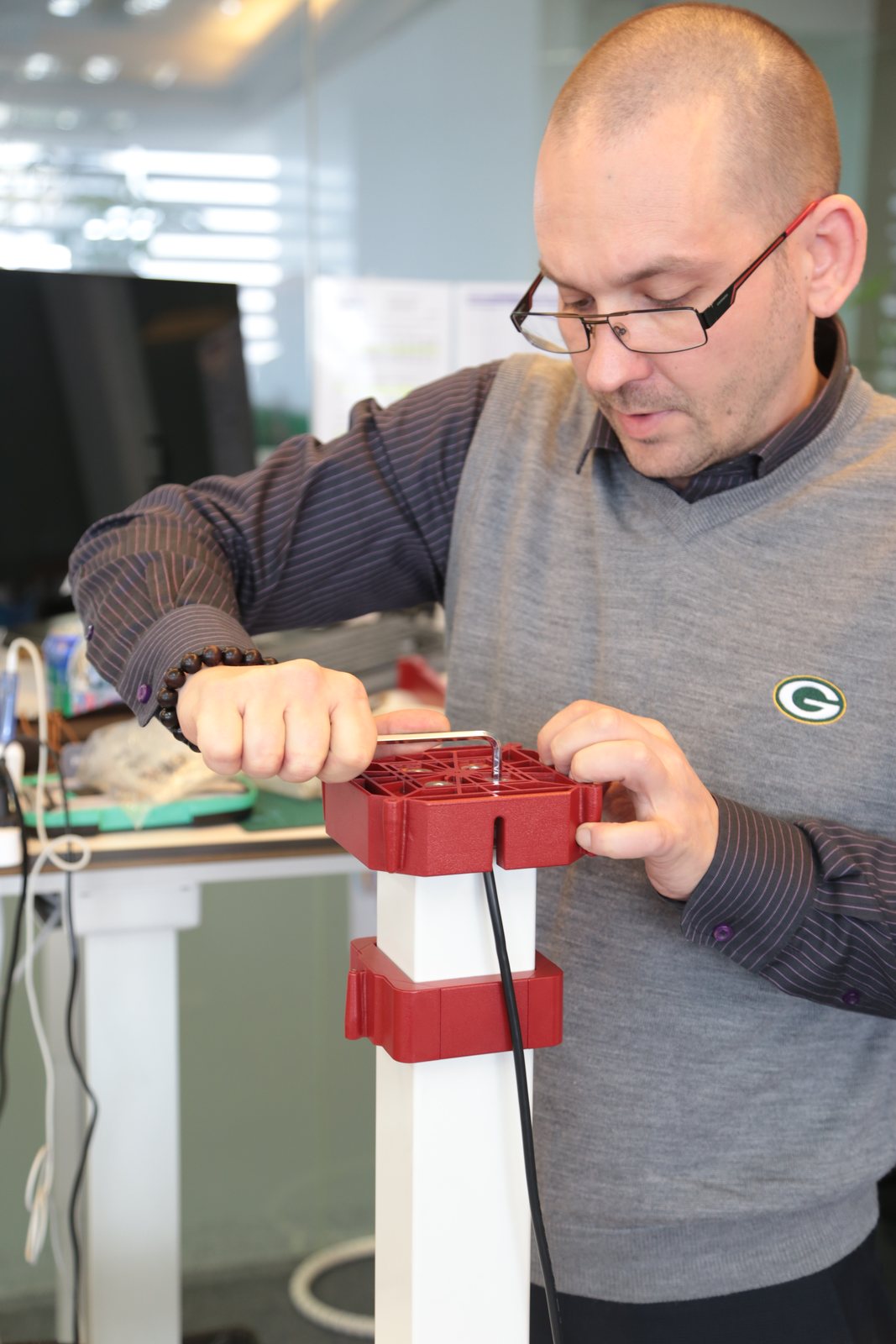 Jacob Goettler testing a ZEN column prototype assembly